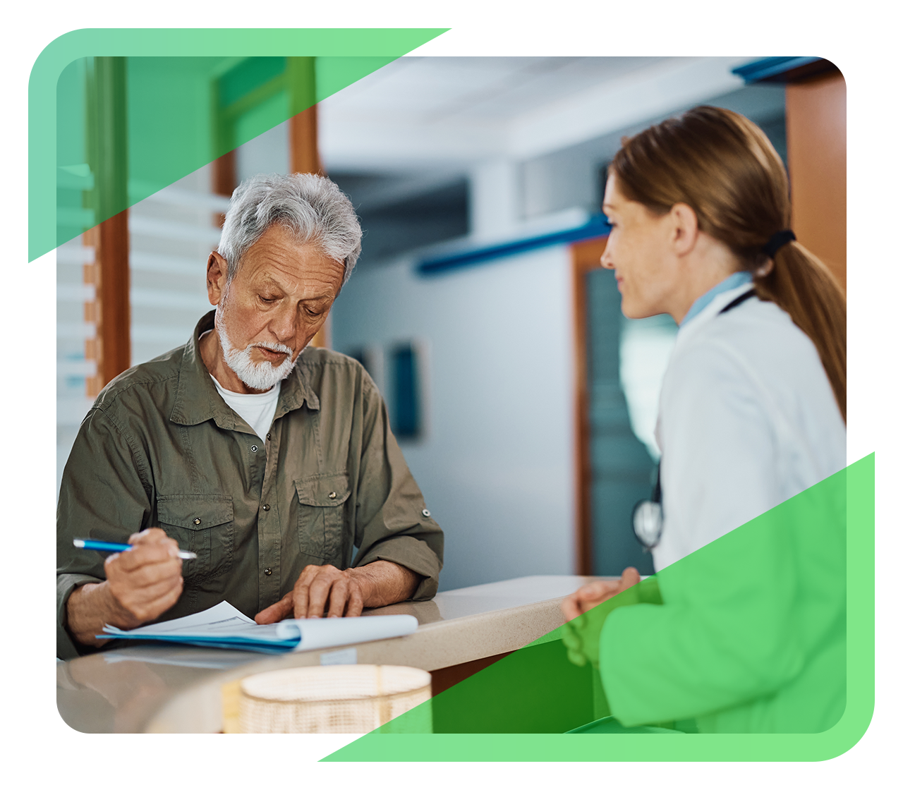 A patient fills out his medical history with the help of his doctor.