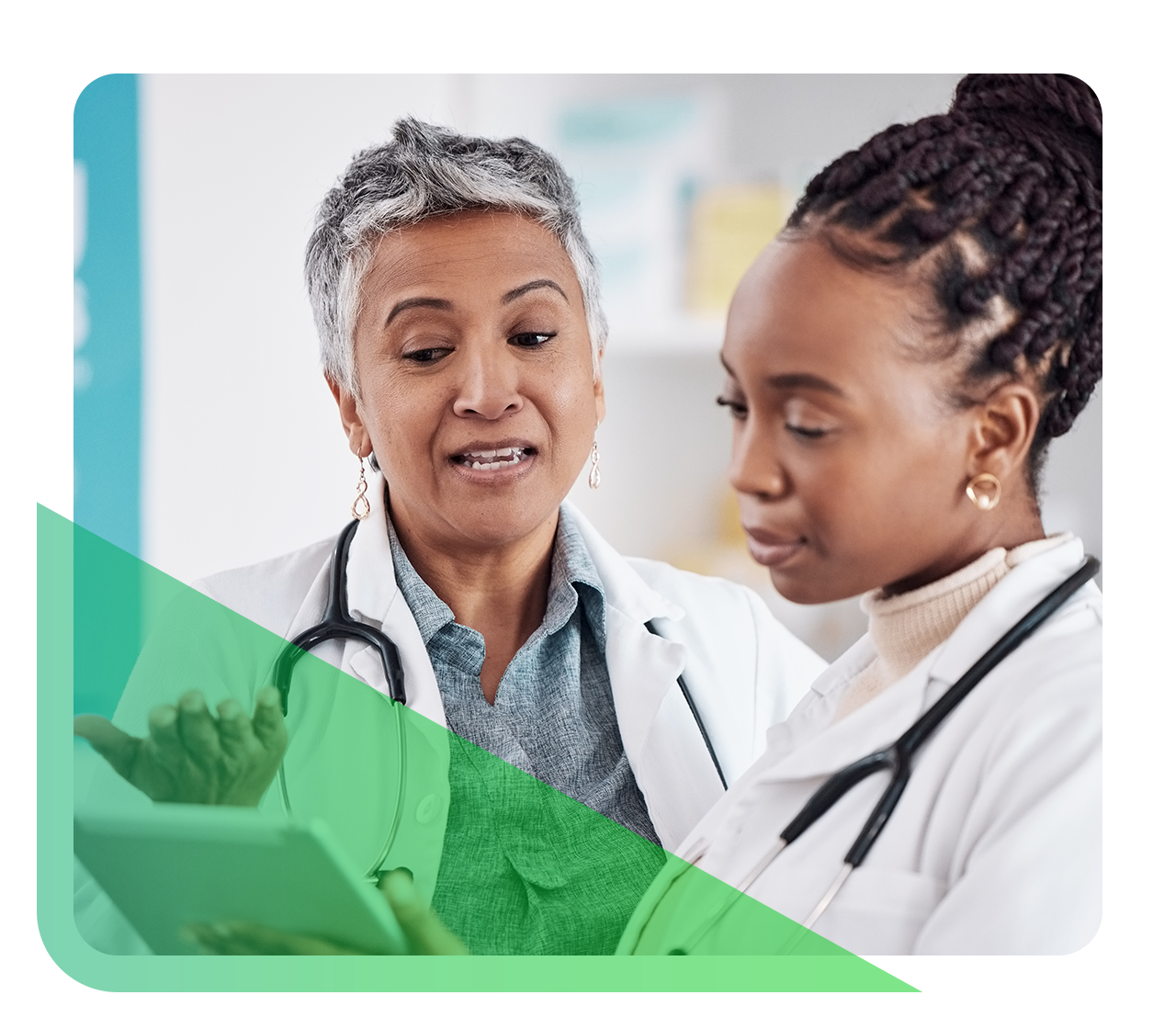 Two doctors consult with one another regarding patient care.