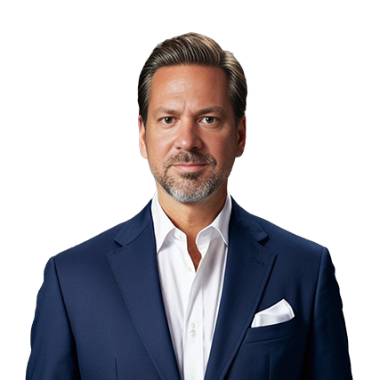 RCM executive man in a navy blue suit and white dress shirt facing forward against a plain white background.